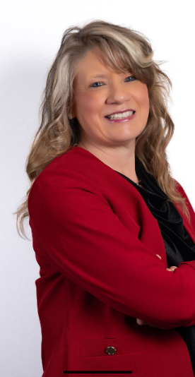 Michelle Wilson, Charleston WV Realtor and owner of Suddenly Sold, smiling in a professional headshot